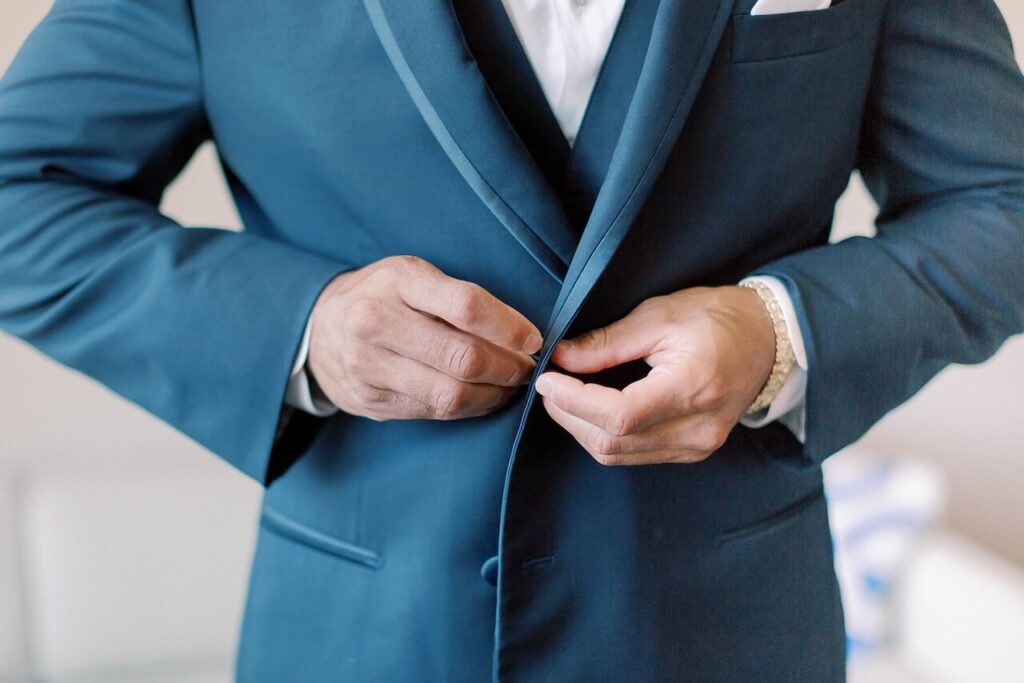 groom getting ready for his wedding at the lake washington hyatt in renton with DJ Dubreezy Entertainment